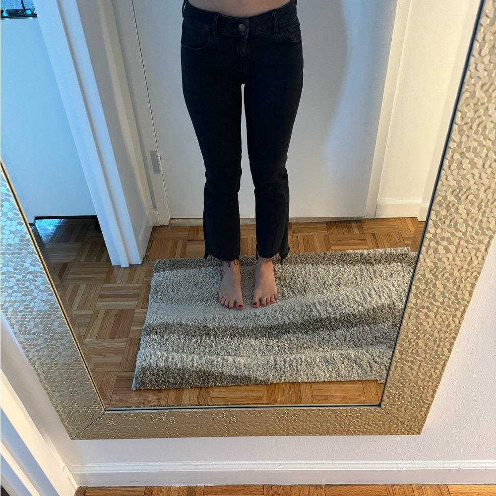 DL 1961 cropped black flare jeans, raw hem.